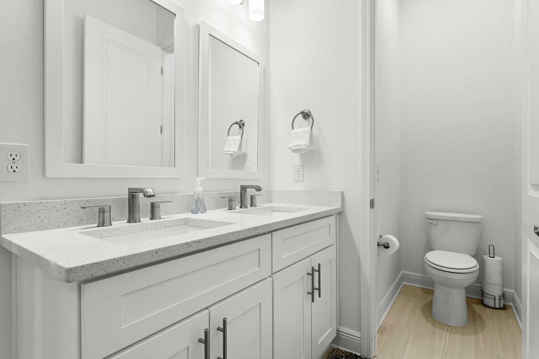 22 Kara Lake Drive Santa Rosa Beach, FL 32459 - Photo 25 of 44 a bathroom with a toilet sink and mirror