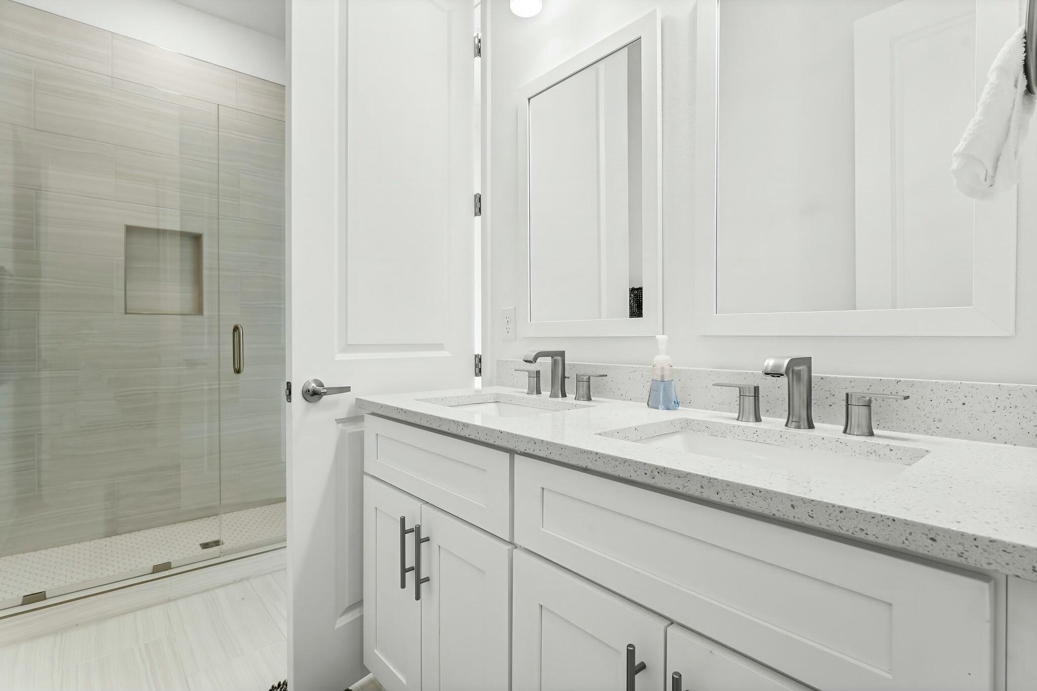 22 Kara Lake Drive Santa Rosa Beach, FL 32459 - Photo 26 of 44 a bathroom with a sink and a shower