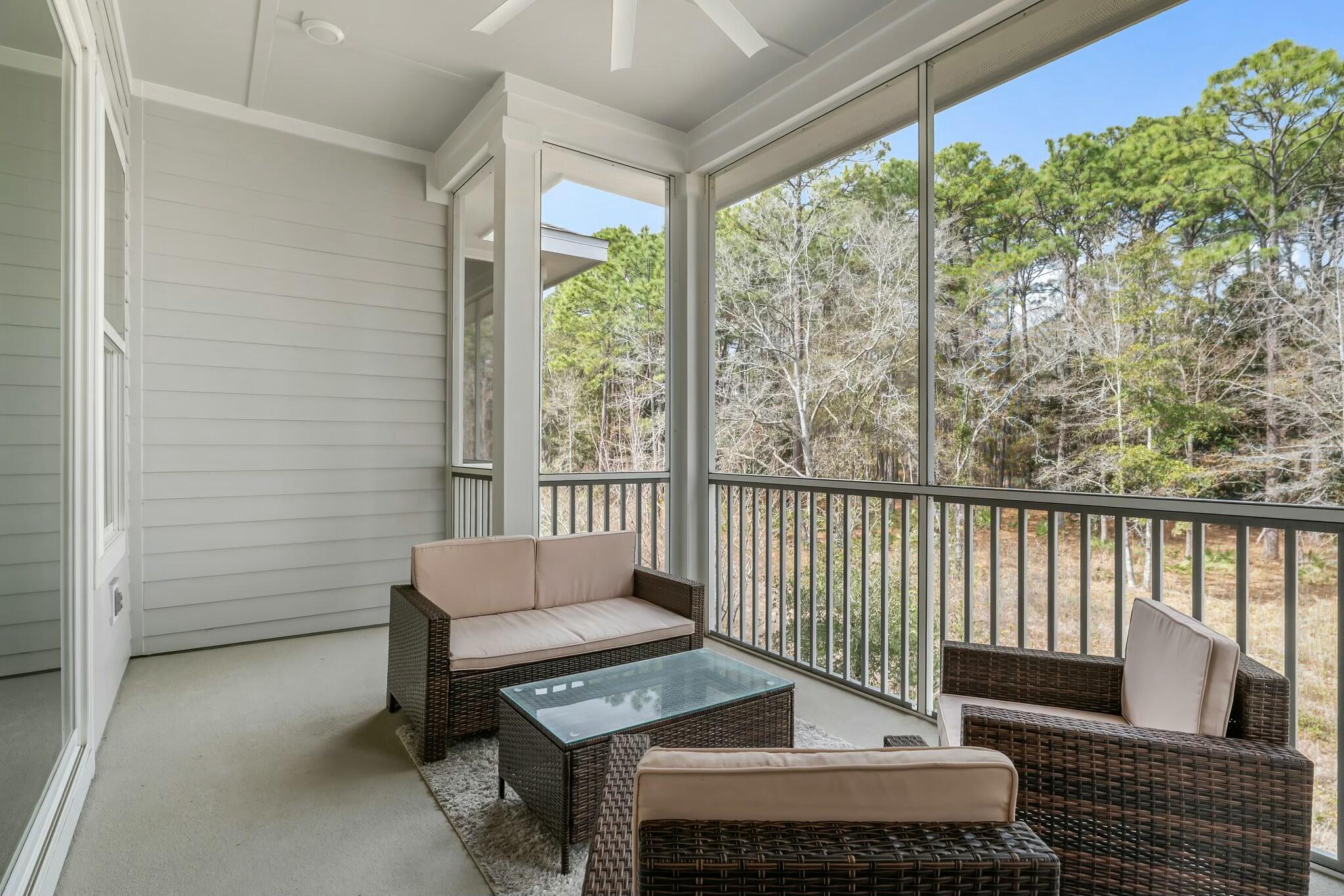 22 Kara Lake Drive Santa Rosa Beach, FL 32459 - Photo 30 of 44 a living room with furniture and a potted plant