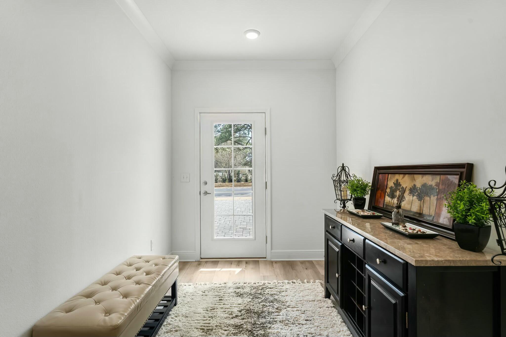 22 Kara Lake Drive Santa Rosa Beach, FL 32459 - Photo 3 of 44 a kitchen with a stove and a flat screen tv