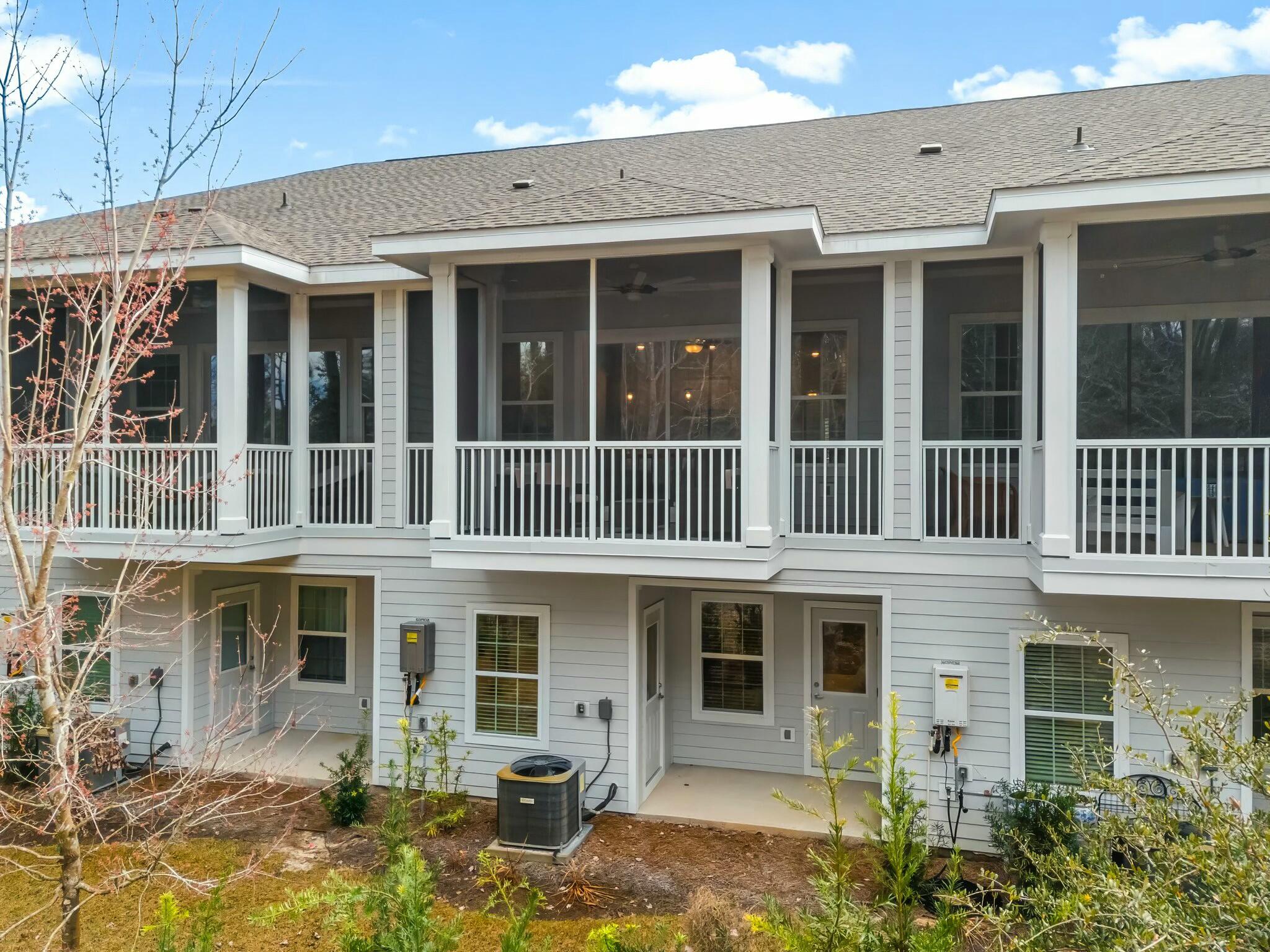 22 Kara Lake Drive Santa Rosa Beach, FL 32459 - Photo 34 of 44 a front view of a building with glass windows