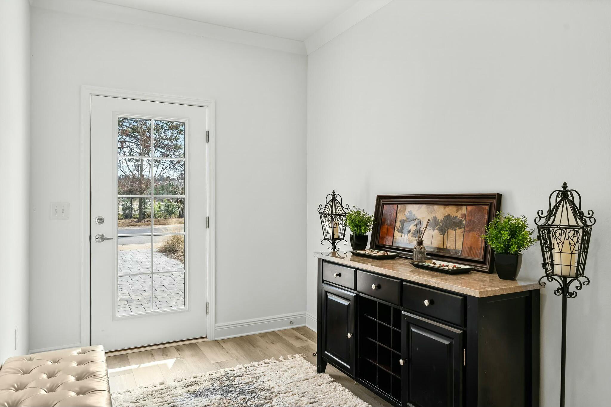 22 Kara Lake Drive Santa Rosa Beach, FL 32459 - Photo 4 of 44 a room with furniture and flat screen tv