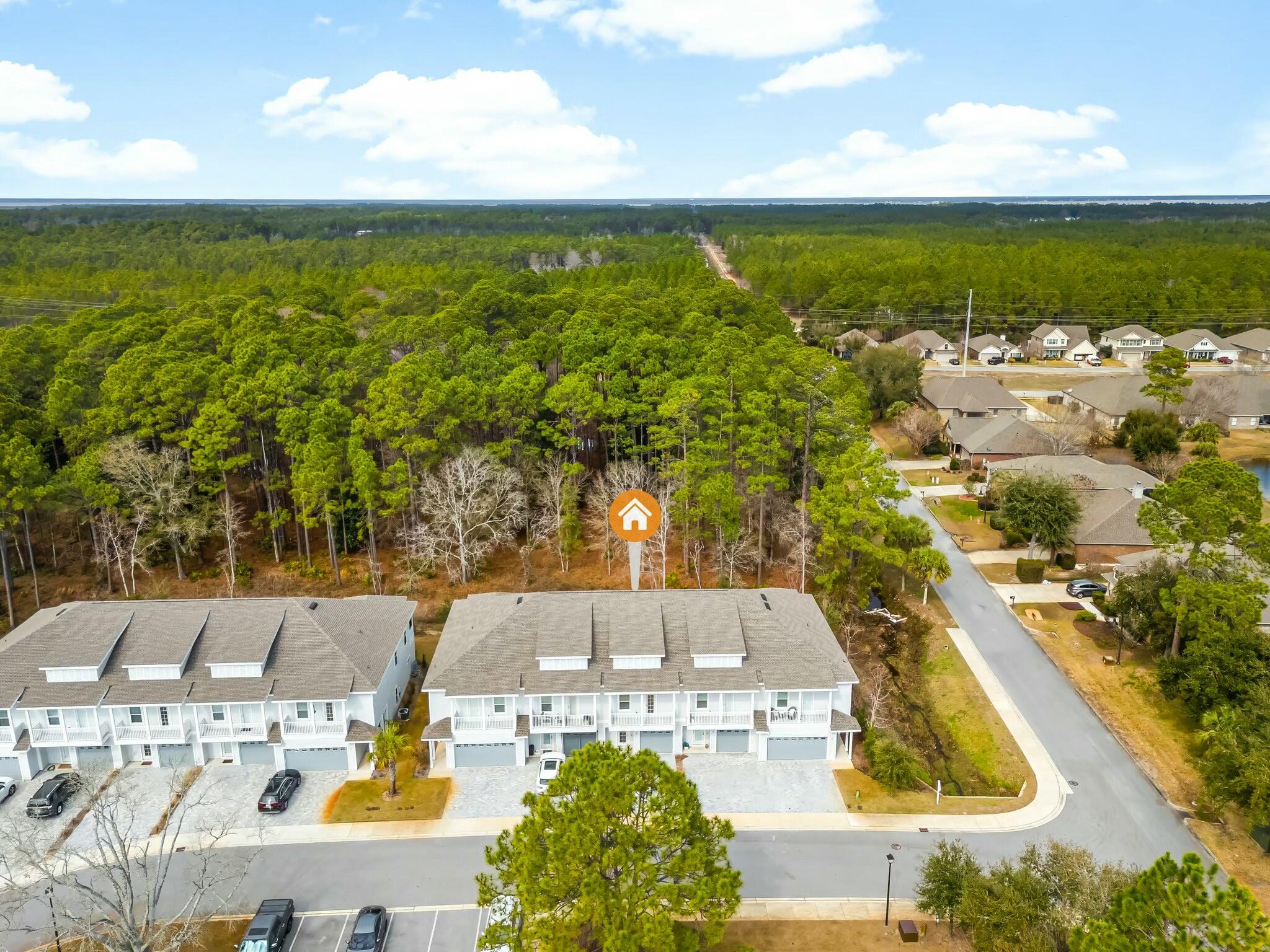 22 Kara Lake Drive Santa Rosa Beach, FL 32459 - Photo 41 of 44 a view of a swimming pool with an outdoor seating