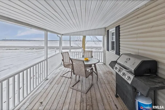a view of a balcony with chairs