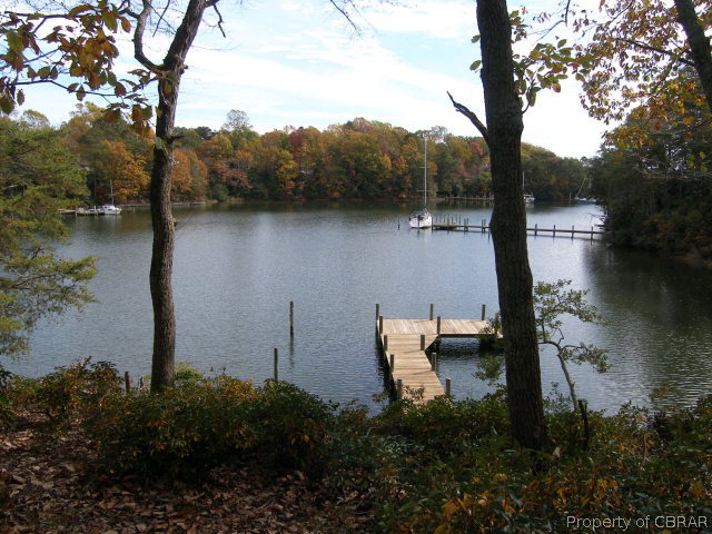 879 West Point Road Lancaster, VA 22503 - Photo 7 of 38 a view of a lake with a mountain view