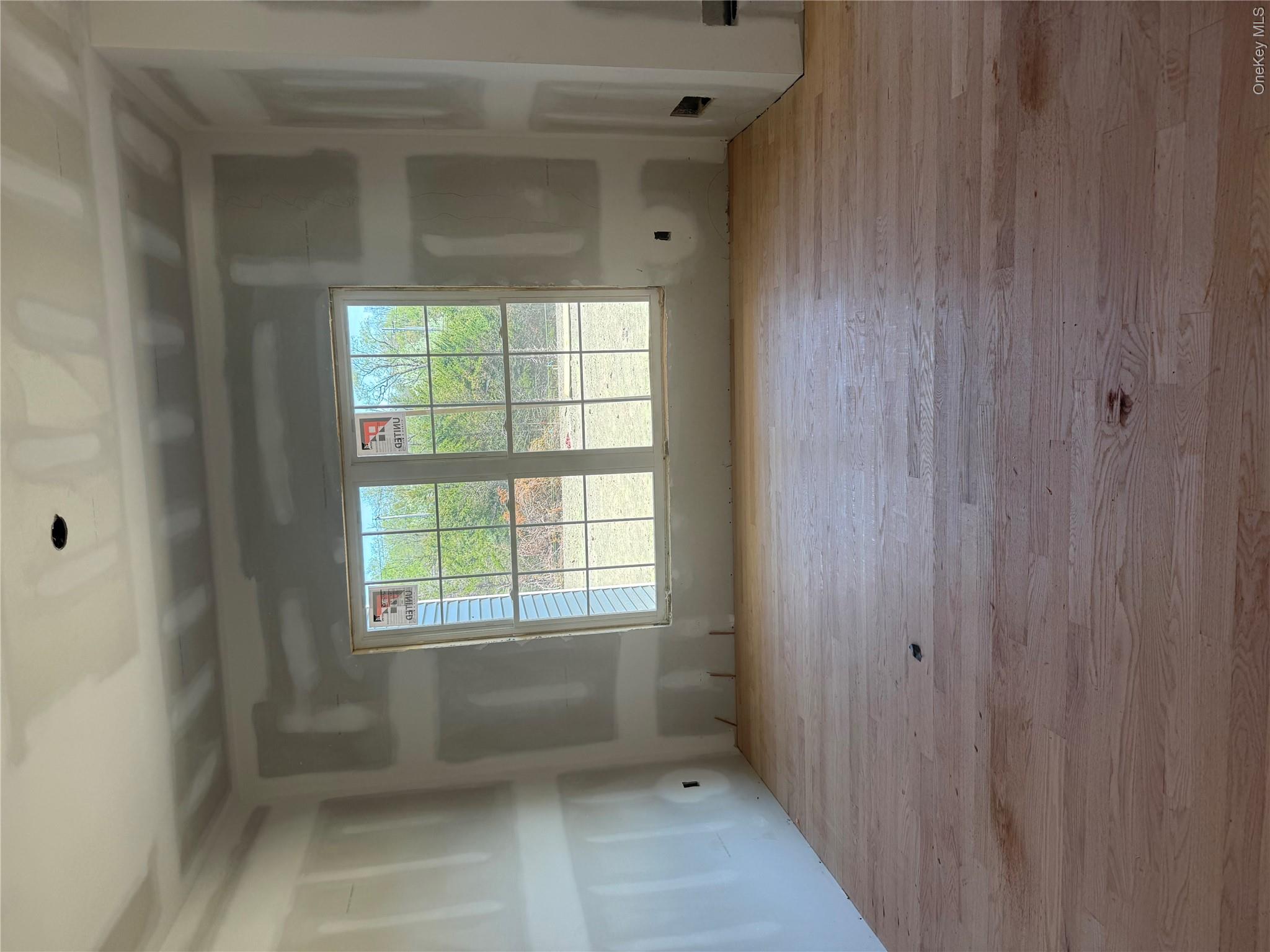 489 Union Corners Road Florida, NY 10921 - Photo 15 of 21 a view of an empty room with a window