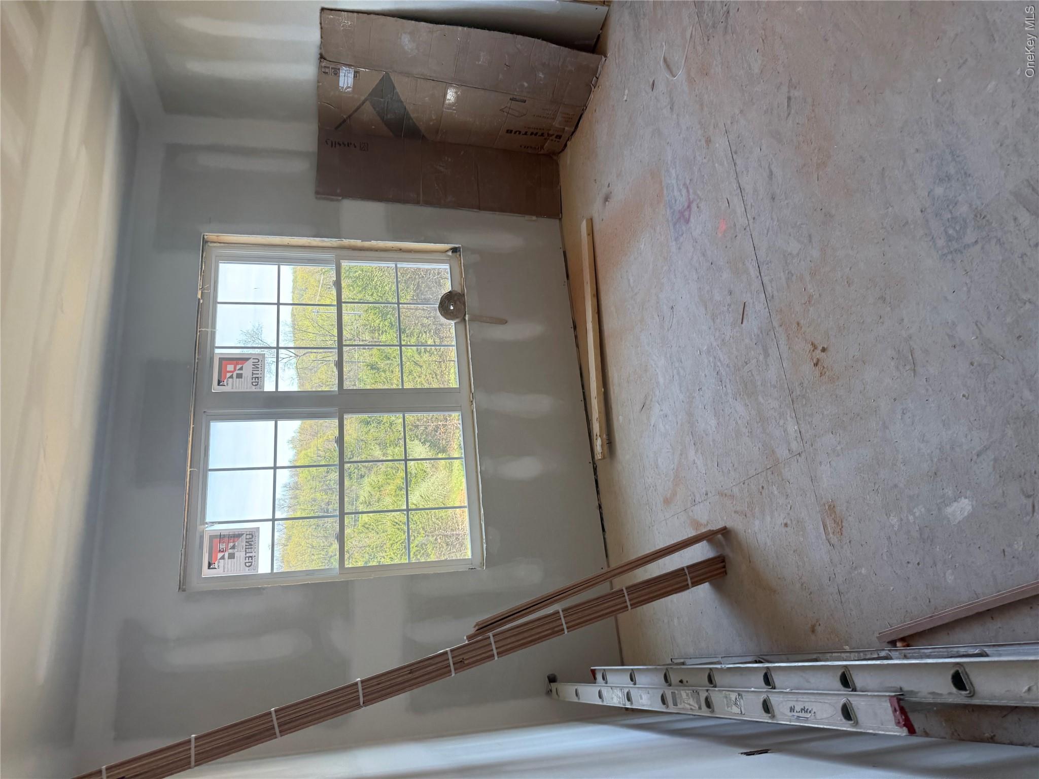 489 Union Corners Road Florida, NY 10921 - Photo 10 of 21 an empty room with windows