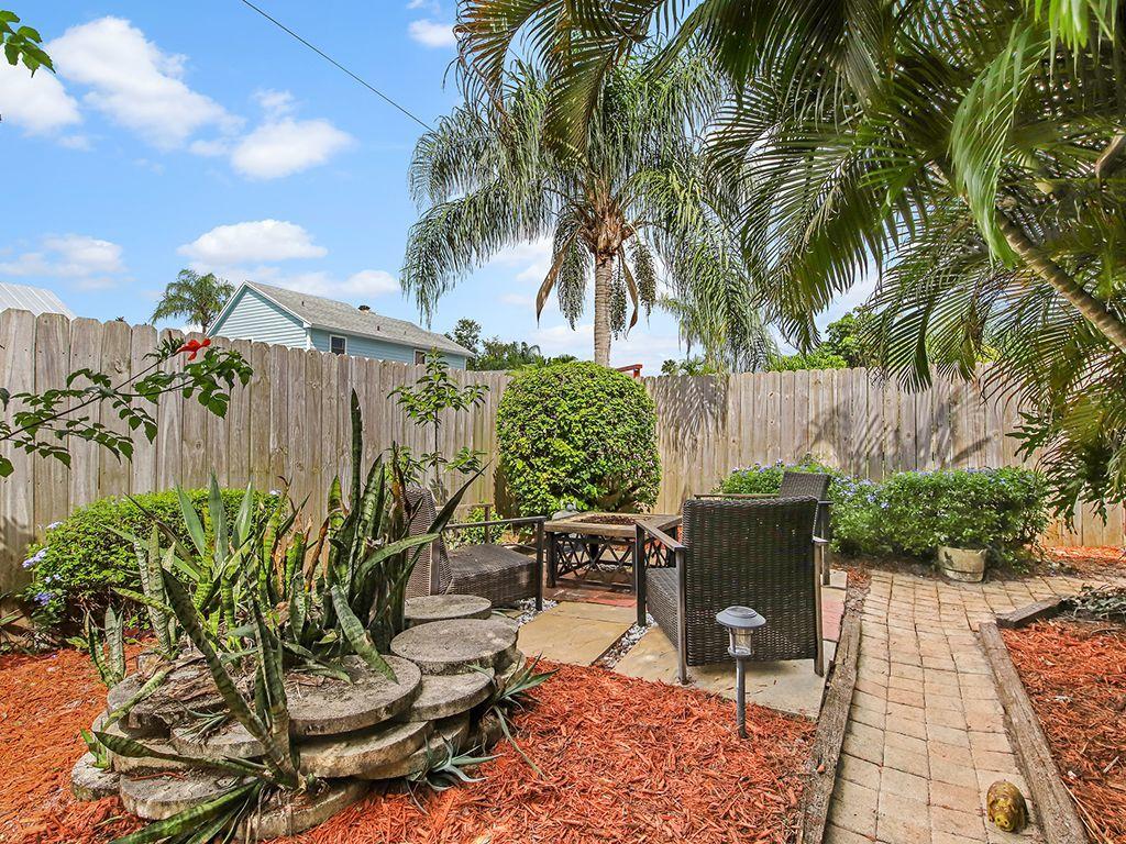 5931 Southeast Pine Drive Stuart, FL 34997 - Photo 20 of 24 a view of outdoor space yard and patio