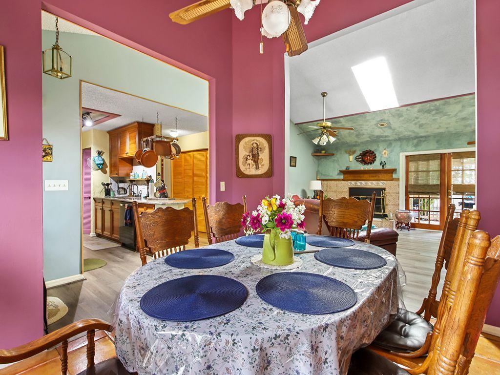 5931 Southeast Pine Drive Stuart, FL 34997 - Photo 7 of 24 a view of a dining room with furniture