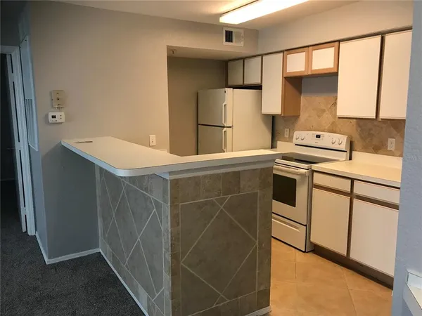 a utility room with washer and dryer