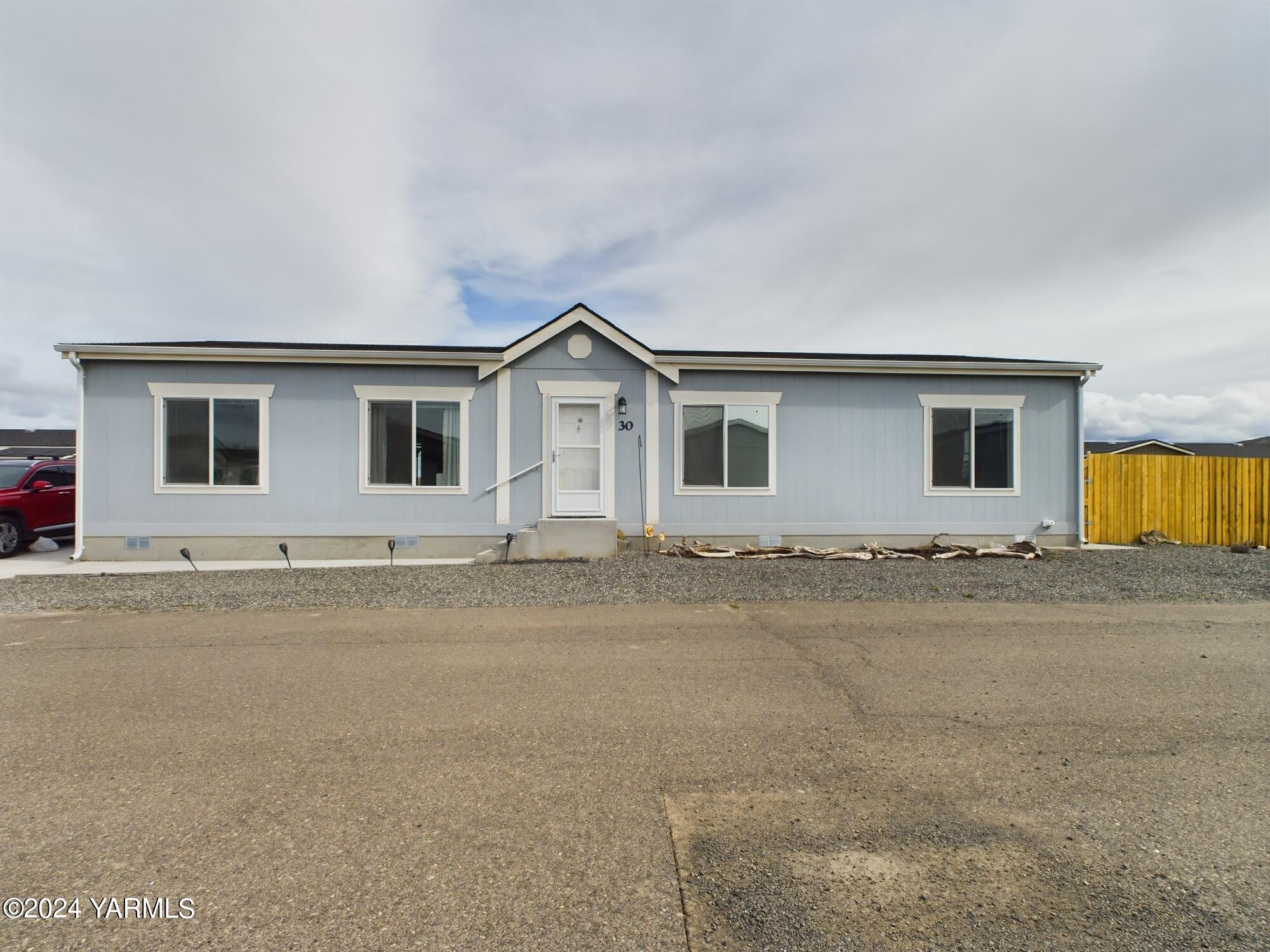 2802 South 5th Avenue, Unit 30 Union Gap, WA 98903 - Photo 27 of 27 front view of a house with a street