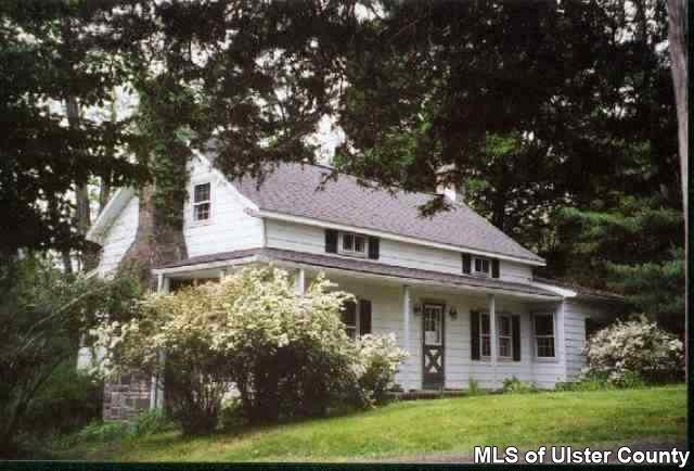 237 Vly Atwood Road Stone Ridge, NY 12484 - Photo 1 of 5 a front view of a house with garden