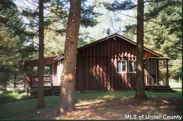 237 Vly Atwood Road Stone Ridge, NY 12484 - Photo 3 of 5 a backyard of a house with lots of green space