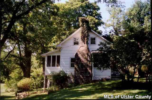 237 Vly Atwood Road Stone Ridge, NY 12484 - Photo 4 of 5 a front view of a house with a garden