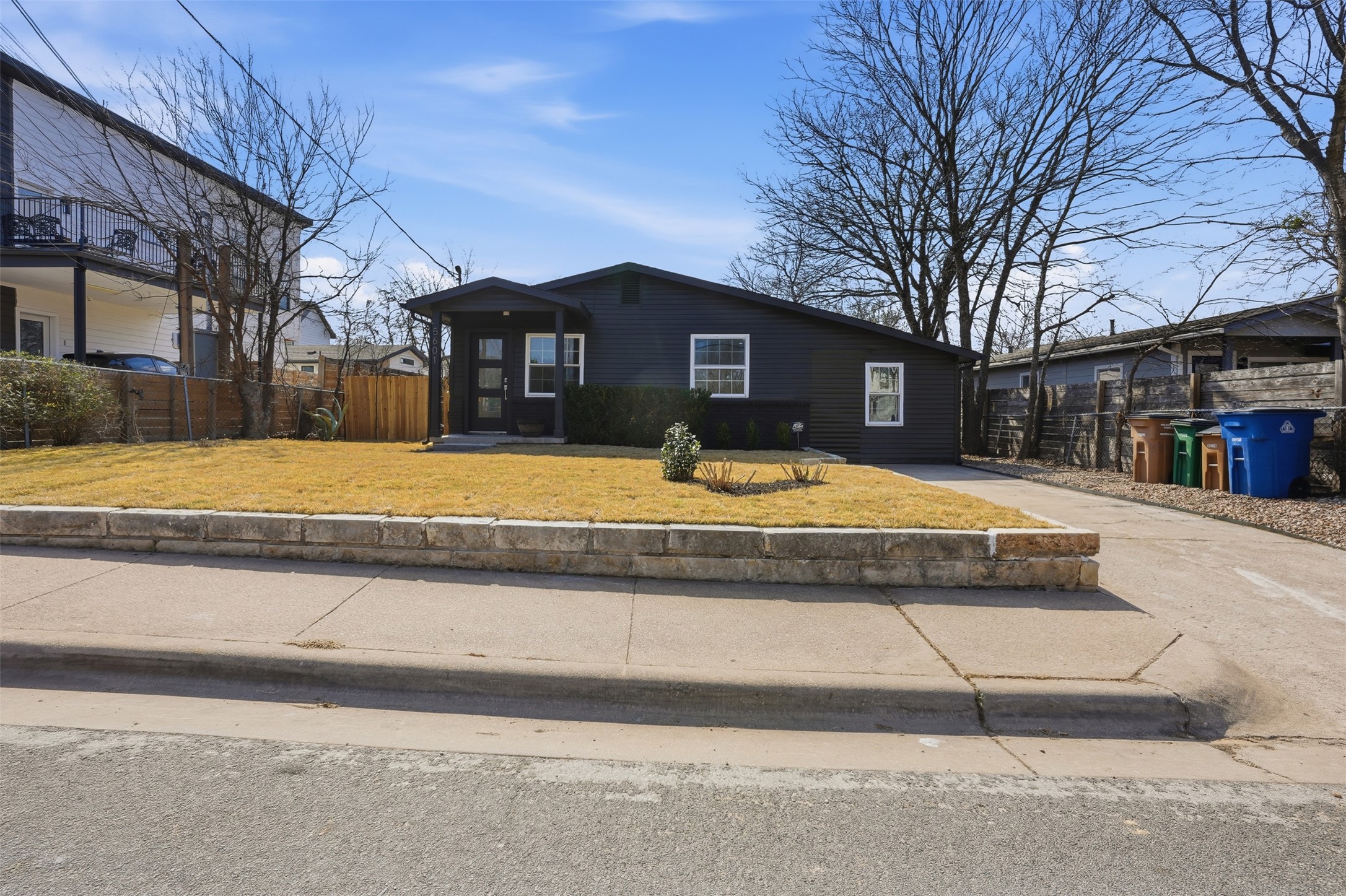 5601 Samuel Huston Avenue Austin, TX 78721 - Photo 2 of 24 View of front of house featuring driveway