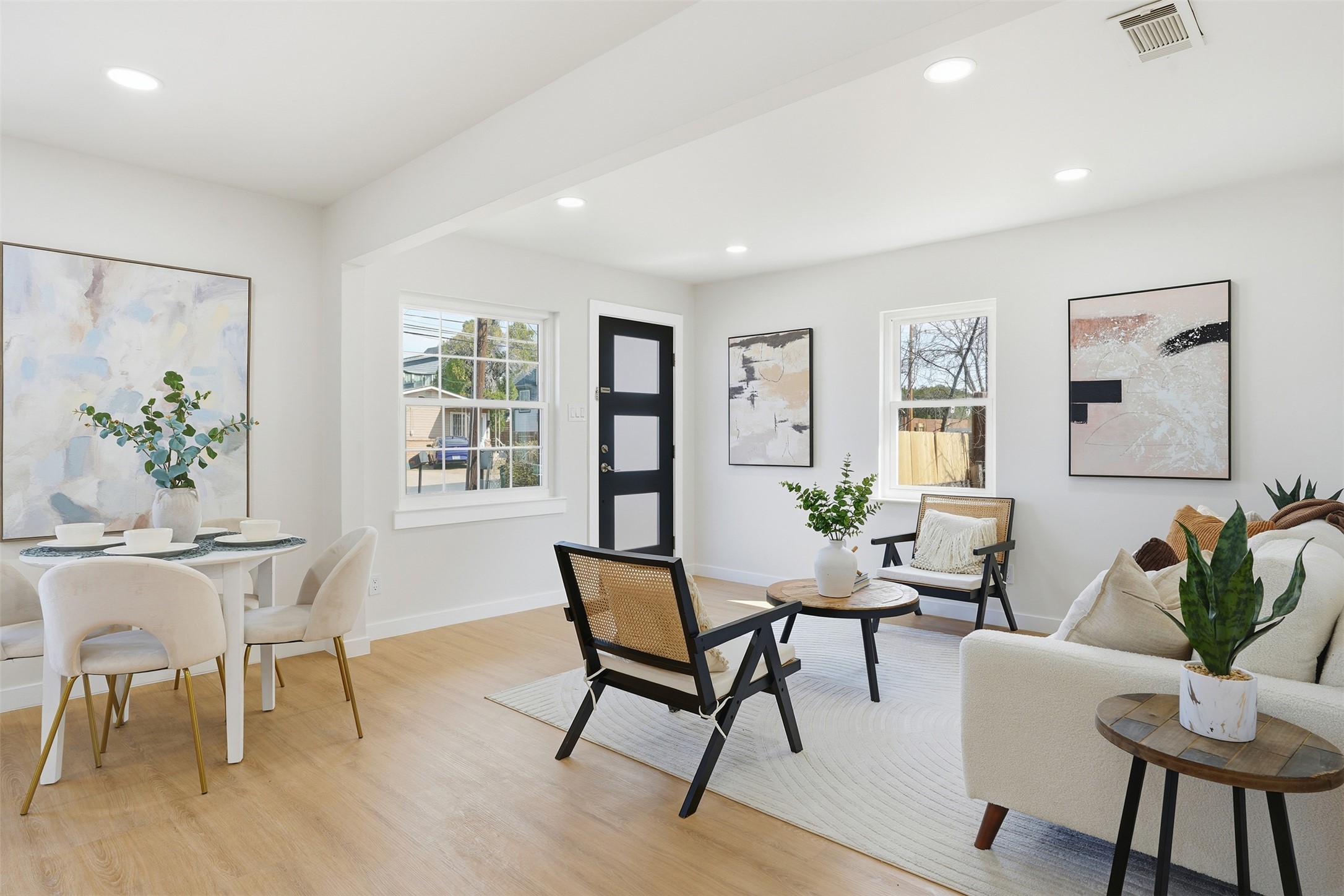 5601 Samuel Huston Avenue Austin, TX 78721 - Photo 7 of 24 Sitting room featuring light wood-style floors and recessed lighting