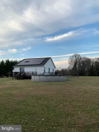 a view of a big yard next to a big yard