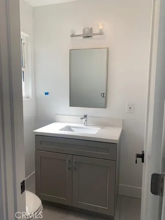 a bathroom with a sink and a toilet