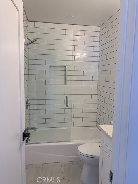 5340 South J Street Oxnard, CA 93033 - Photo 15 of 17 a bathroom with a shower and a toilet