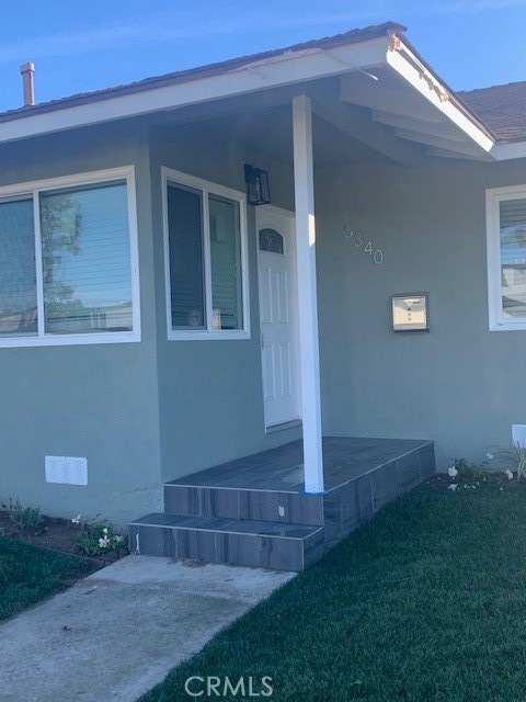 5340 South J Street Oxnard, CA 93033 - Photo 2 of 17 a view of house with backyard and garden