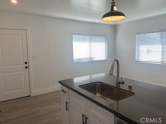 5340 South J Street Oxnard, CA 93033 - Photo 4 of 17 a kitchen with a sink a counter space and a window