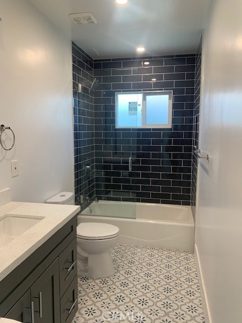 5340 South J Street Oxnard, CA 93033 - Photo 5 of 17 a bathroom with a toilet a sink and shower