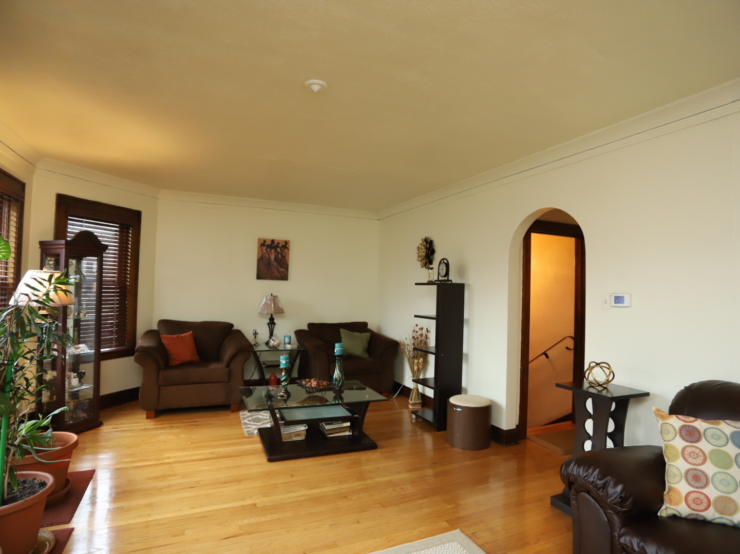 10416 South Sangamon Street Chicago, IL 60643 - Photo 16 of 95 a living room with furniture gym equipment and a fireplace