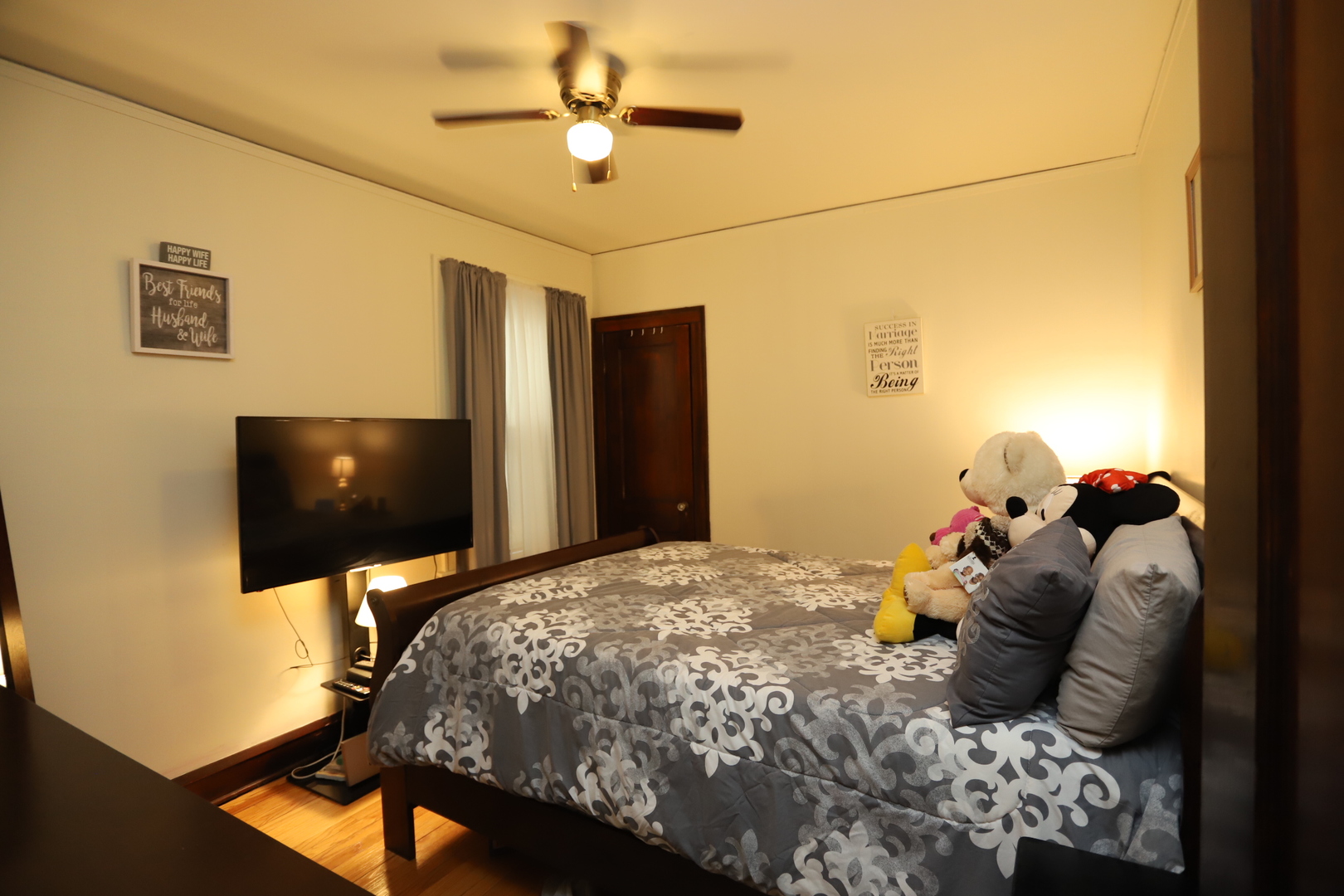 10416 South Sangamon Street Chicago, IL 60643 - Photo 45 of 95 a bedroom with a bed and a flat tv screen on the dresser