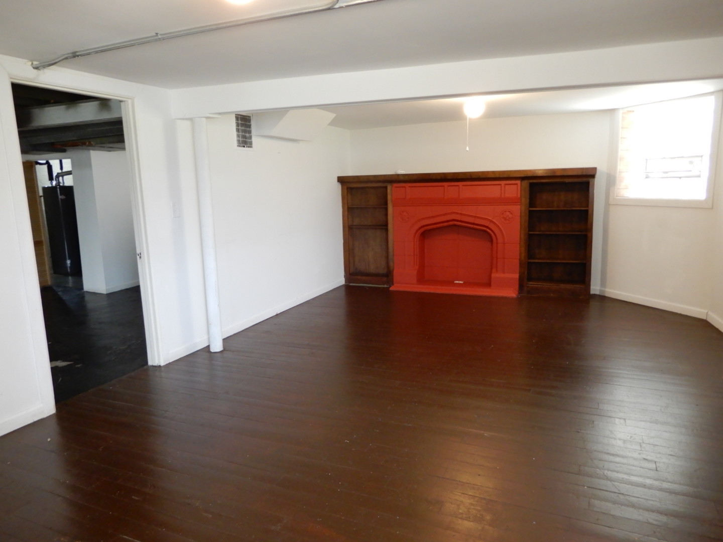 10416 South Sangamon Street Chicago, IL 60643 - Photo 60 of 95 a view of an empty room with wooden floor and a window