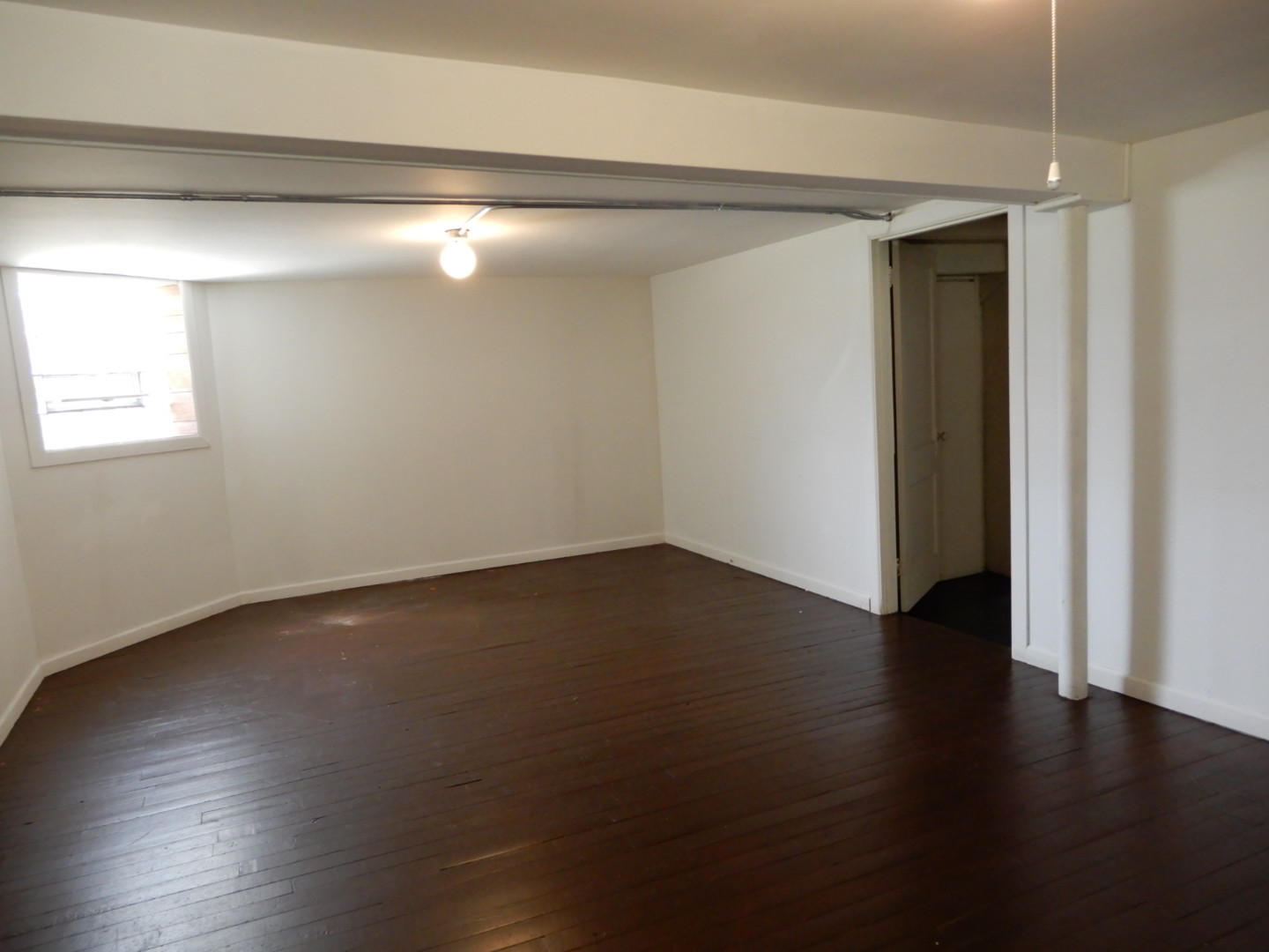 10416 South Sangamon Street Chicago, IL 60643 - Photo 61 of 95 a view of an empty room with wooden floor and a window