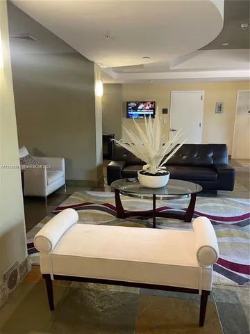 a view of a lake with a building in the background