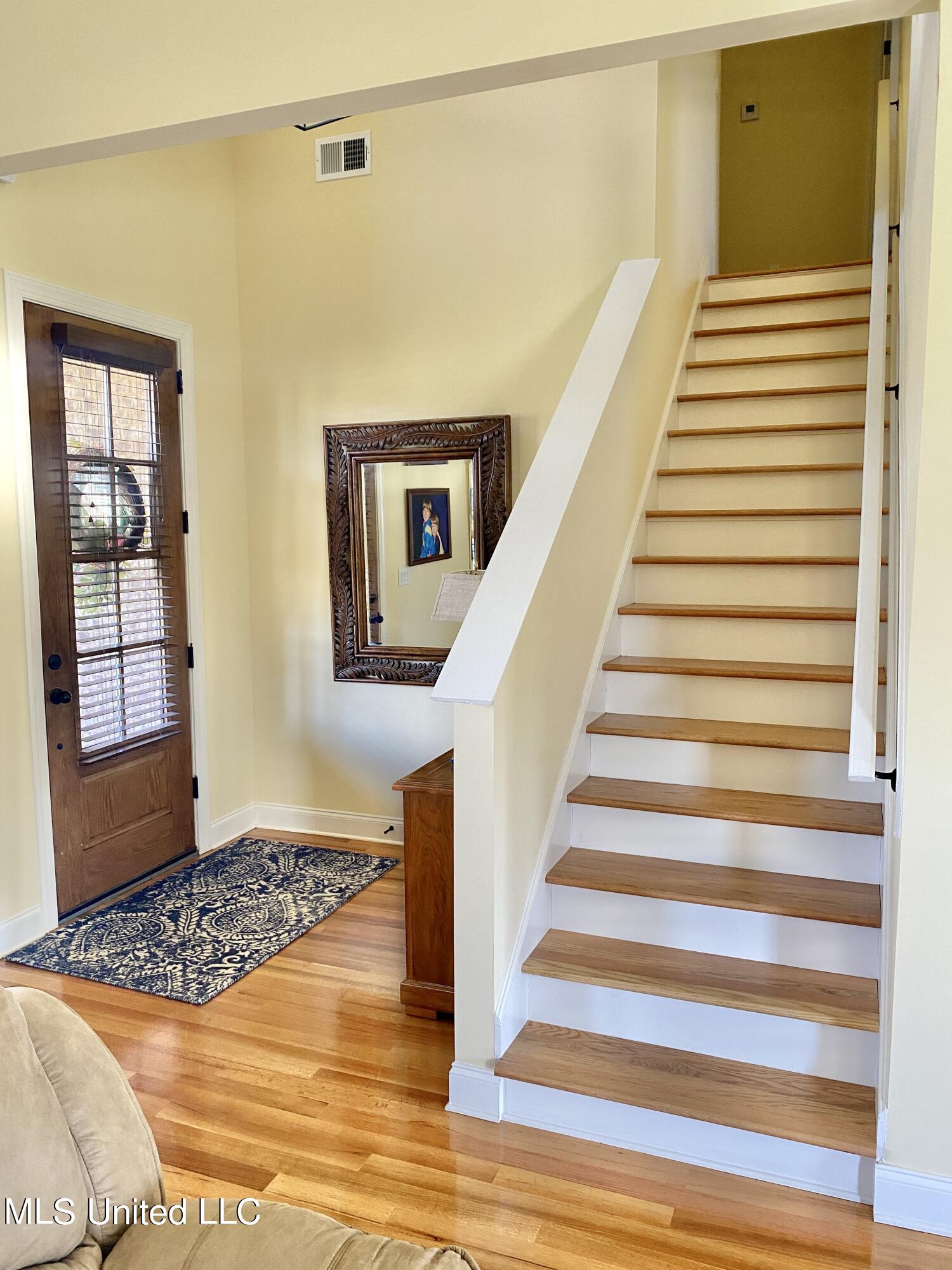 4621 Riva Ridge Drive Olive Branch, MS 38654 - Photo 27 of 31 Living Room Stairs