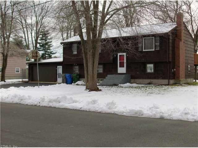 40 Lacava Road Bristol, CT 06010 - Photo 1 of 1 a front view of a house with a yard and garage