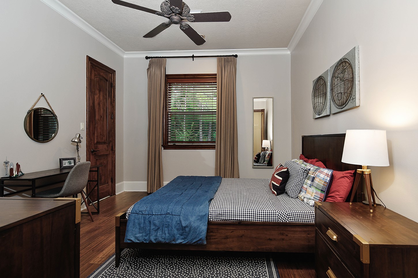 119 Angel Leaf Road The Woodlands, TX 77380 - Photo 31 of 50 a bed room with a bed window and a chandelier
