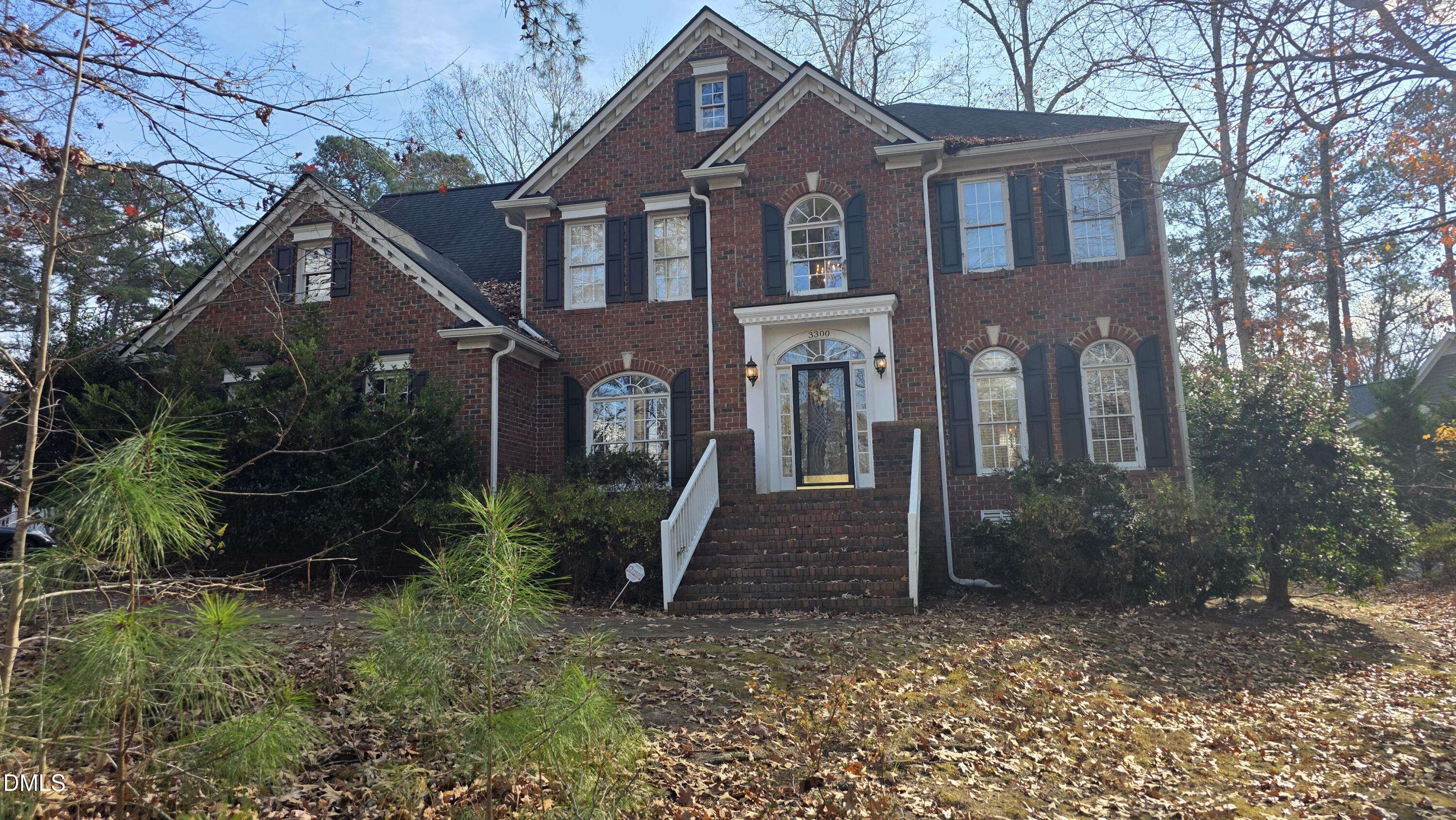 3300 Kemble Ridge Drive Wake Forest, NC 27587 - Photo 2 of 12 a front view of a house with garden
