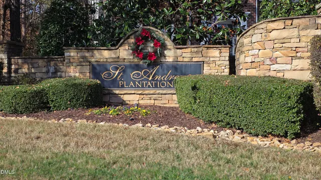 a view of outdoor space sign and lots of green space