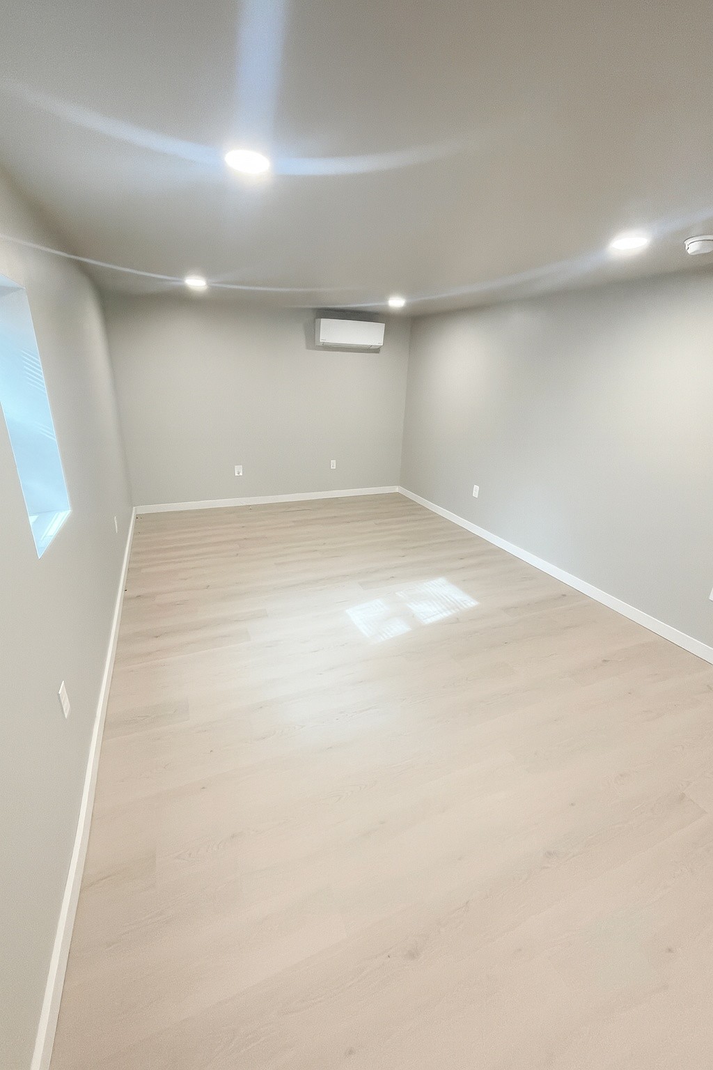 605 Montgomery Street Cowan, TN 37318 - Photo 3 of 7 an empty room with a natural light