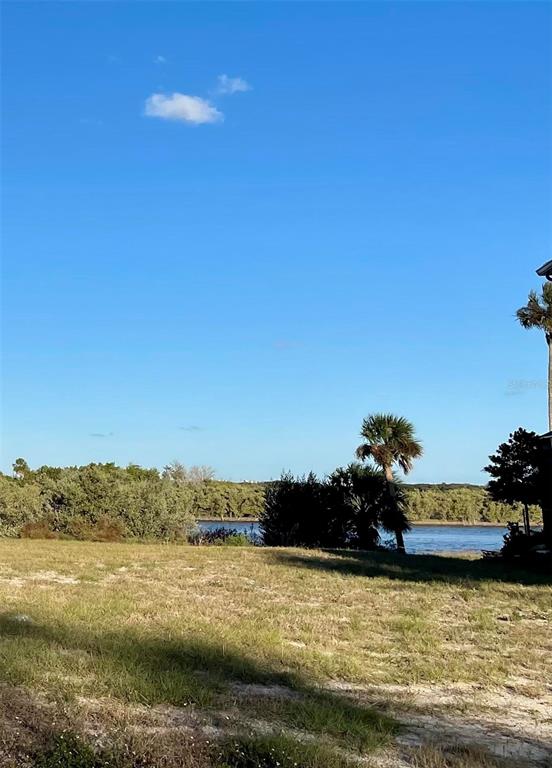 66 Coronado Road Flagler Beach, FL 32136 - Photo 2 of 3 a view of a ocean with beach