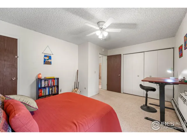 a bathroom with a sink toilet a mirror and shower