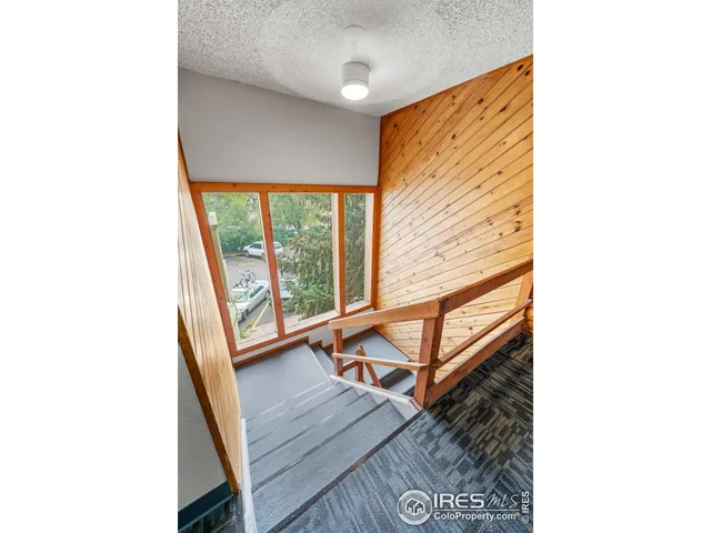 a utility room with dryer washer and a window