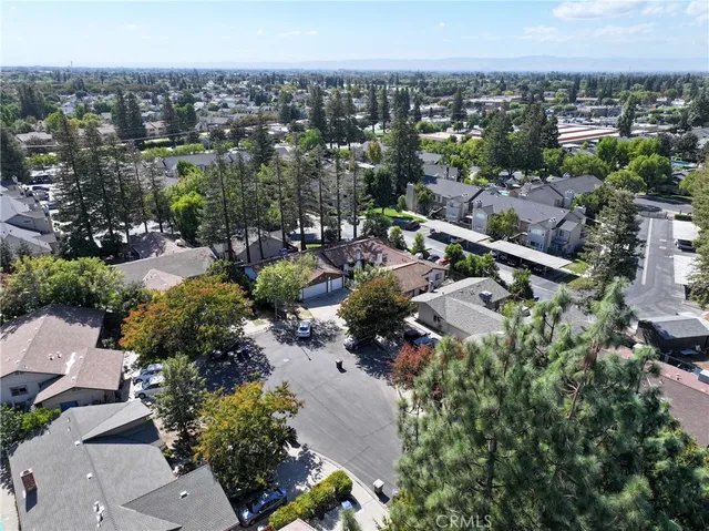 an aerial view of a city with lots of residential buildings
