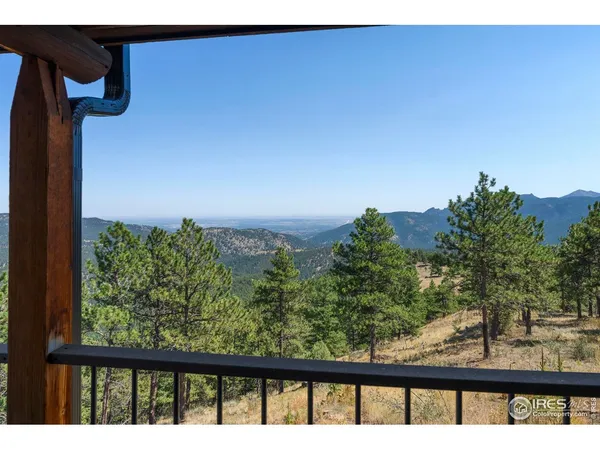 a kitchen with stainless steel appliances kitchen island granite countertop a refrigerator and a stove top oven