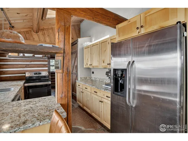 a kitchen with a stove and a microwave