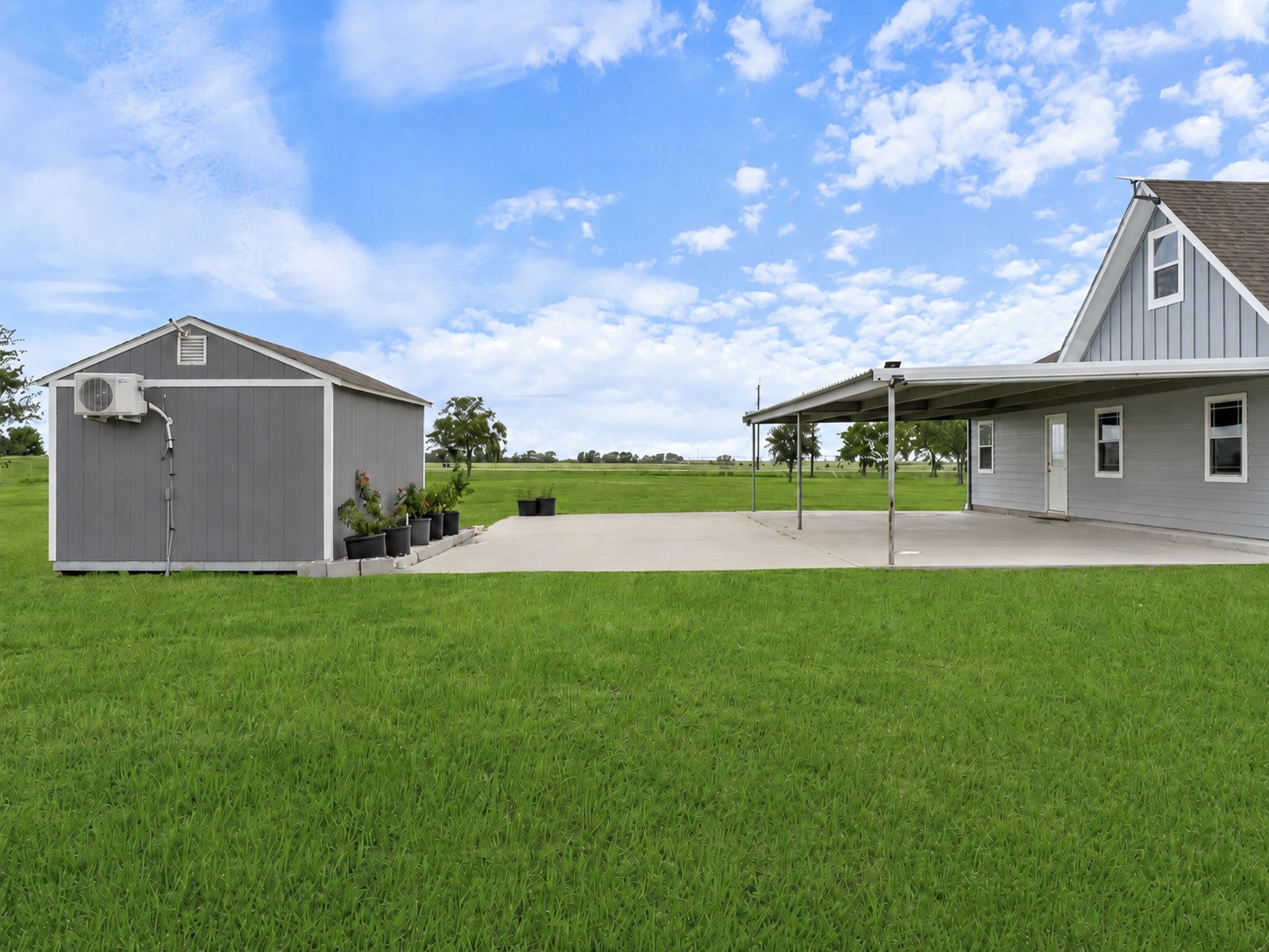 11301 South FM 441 Road El Campo, TX 77437 - Photo 25 of 32 The expansive carport with EV charger also provides additional extended outdoor entertaining space.