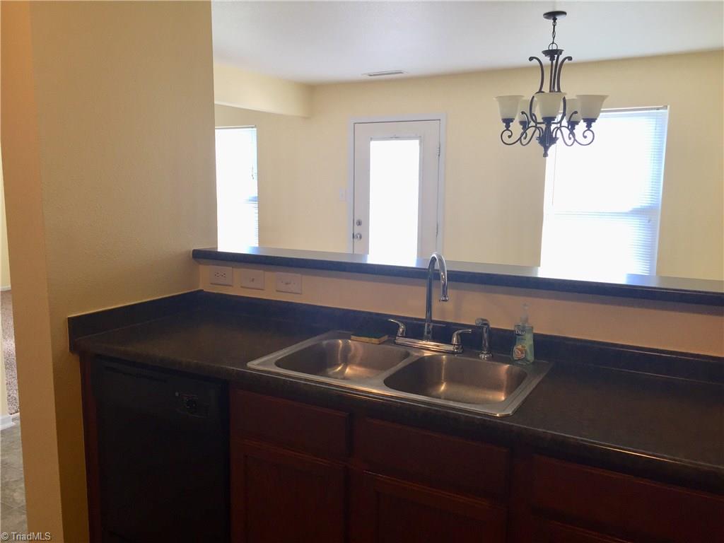 749 Runningbrook Lane Rural Hall, NC 27045 - Photo 7 of 21 Kitchen over looking Dining Room