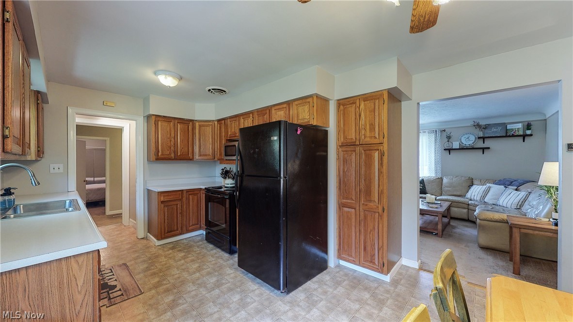 11479 Valley View Road Northfield, OH 44067 - Photo 6 of 35 Living room open to dining and kitchen
