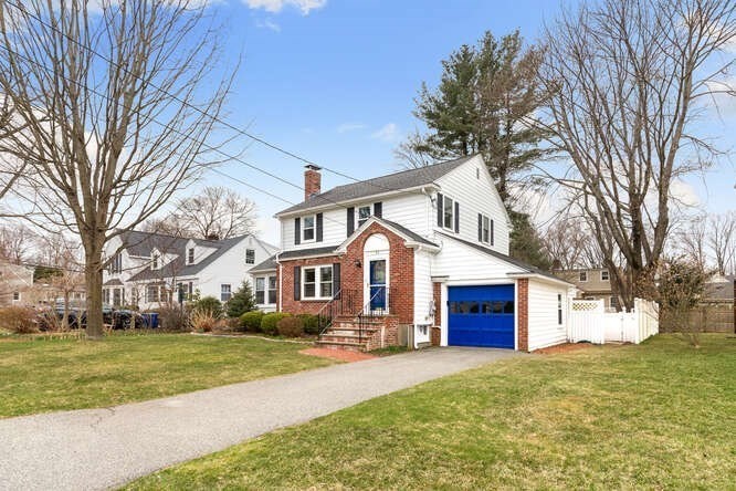 84 Gleason Road Lexington, MA 02420 - Photo 3 of 32 a front view of house with yard and trees