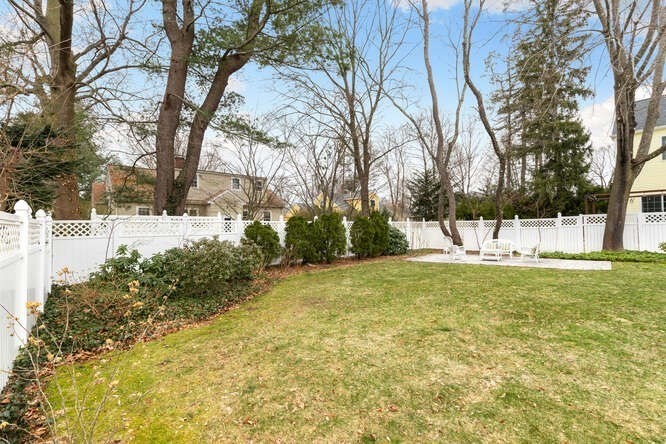 84 Gleason Road Lexington, MA 02420 - Photo 32 of 32 a view of a garden with a tree