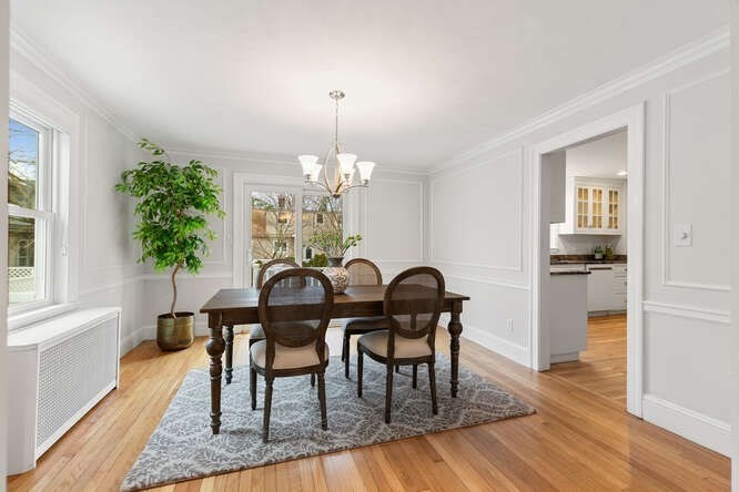 84 Gleason Road Lexington, MA 02420 - Photo 9 of 32 a view of a dining room with furniture window and wooden floor
