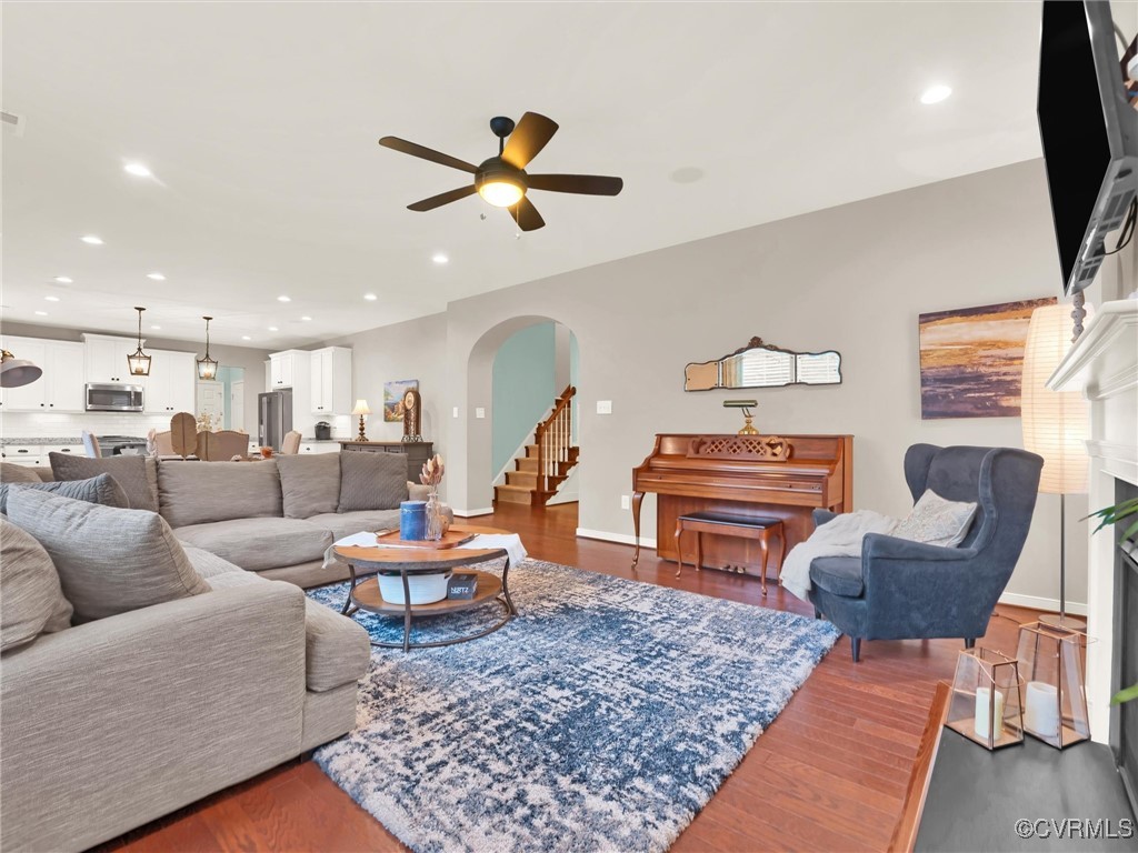 10168 Kellys Bluff Run Ashland, VA 23005 - Photo 11 of 50 a living room with furniture and a flat screen tv